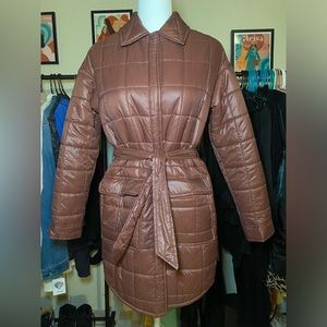 Brown quilted lightweight puffer jacket.